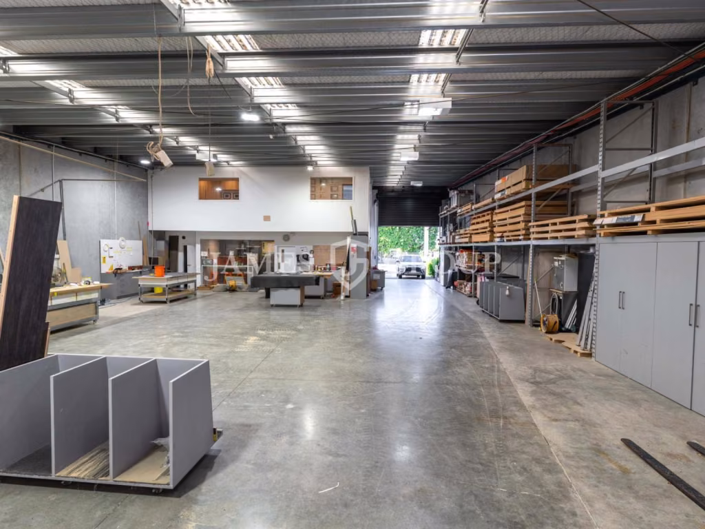 Modern Tilt-slab Unit With Roller Door Access